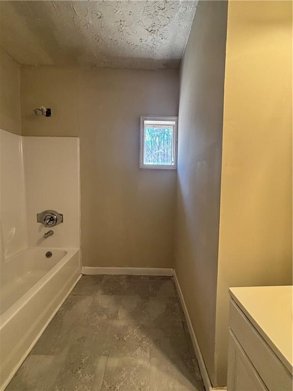 2103 River Rd, Ellenwood, GA 30294 - bathroom featuring  shower combination and vanity