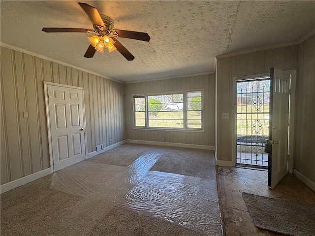 2103 River Rd, Ellenwood, GA 30294 - unfurnished room with ornamental molding, a textured ceiling, and ceiling fan