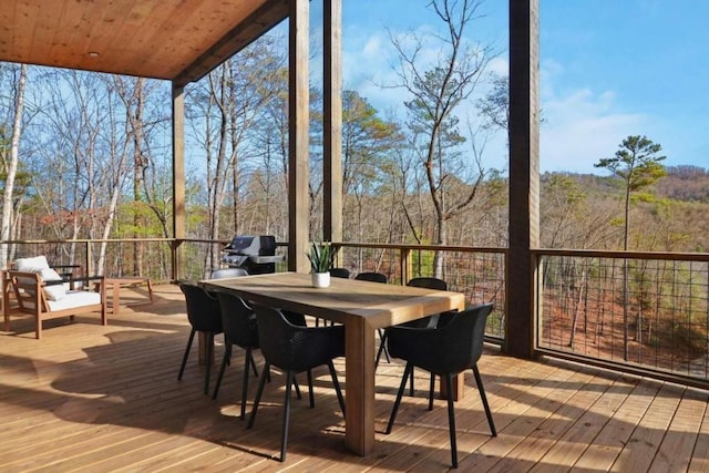 sunroom / solarium with wood ceiling