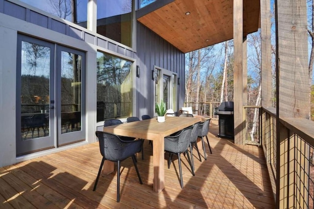 wooden deck featuring area for grilling