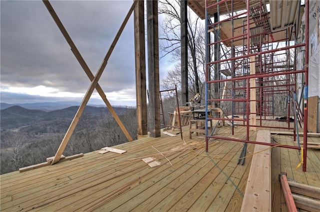 wooden terrace with a mountain view