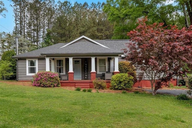 180 Kingston Highway 293 NW, Cartersville, GA 30120 - view of front of house featuring a porch, a front lawn, and a shingled roof