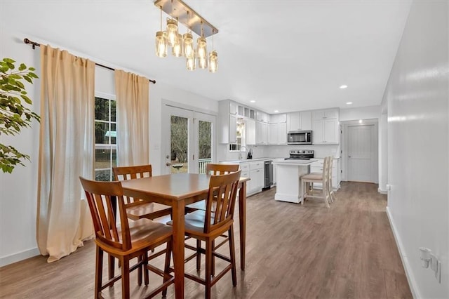 180 Kingston Highway 293 NW, Cartersville, GA 30120 - dining room featuring baseboards, wood finished floors, french doors, recessed lighting, and a chandelier