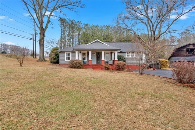 180 Kingston Highway 293 NW, Cartersville, GA 30120 - view of front of house featuring a porch and a front yard