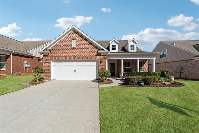 view of front of house with a front lawn, a garage, brick siding, and driveway