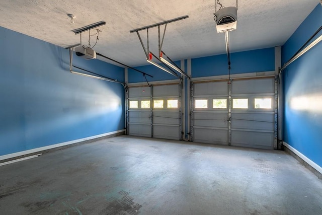 garage with baseboards and a garage door opener