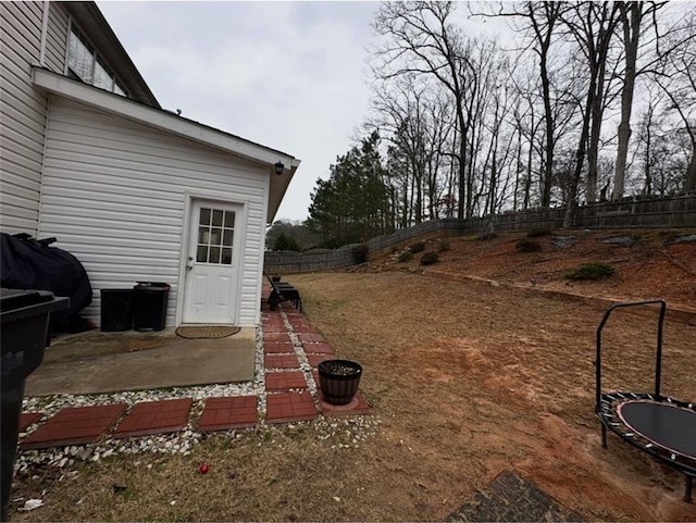 view of yard featuring a fenced backyard and a patio