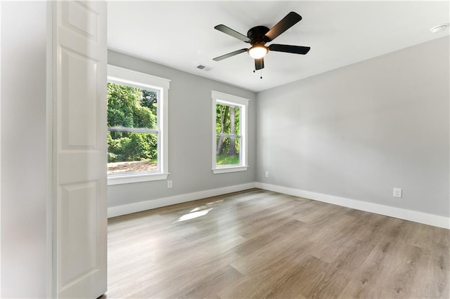 124 Sims Dr, Hiram, GA 30141 - empty room featuring wood finished floors, baseboards, and a ceiling fan