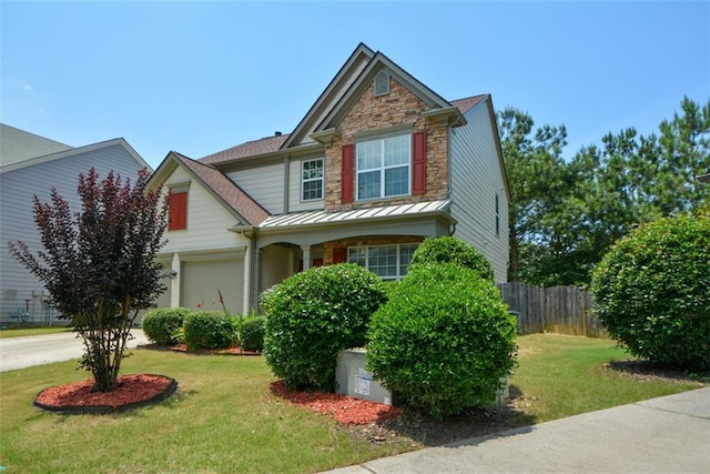 574 Friars Head Dr, Suwanee, GA 30024 - view of front of home featuring a standing seam roof, a metal roof, a garage, and driveway