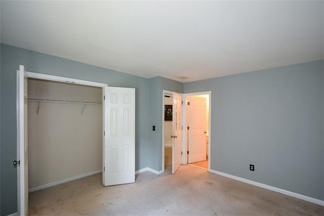 574 Friars Head Dr, Suwanee, GA 30024 - unfurnished bedroom featuring a closet and carpet