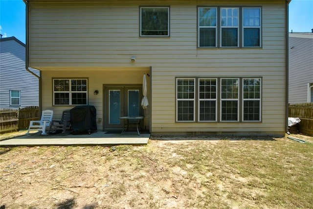 574 Friars Head Dr, Suwanee, GA 30024 - rear view of property with a patio area