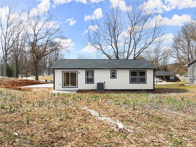 back of property featuring a patio and central air condition unit