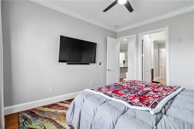 2300 Peachford Rd Unit 1410, Atlanta, GA 30338 - bedroom featuring ceiling fan, ensuite bath, hardwood / wood-style flooring, and crown molding