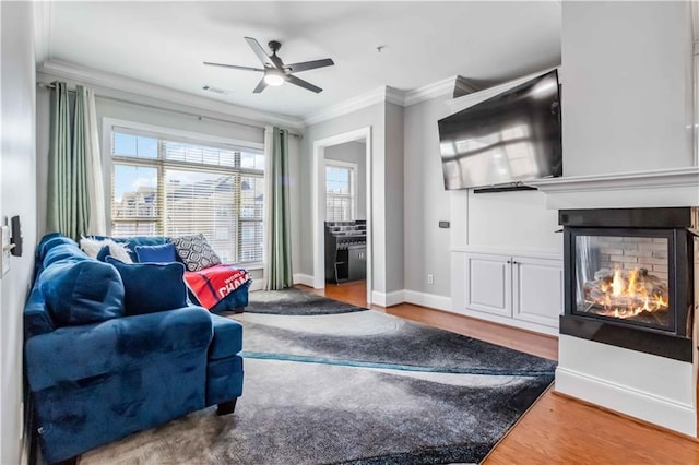 2300 Peachford Rd Unit 1410, Atlanta, GA 30338 - living room with ceiling fan, hardwood / wood-style flooring, and crown molding