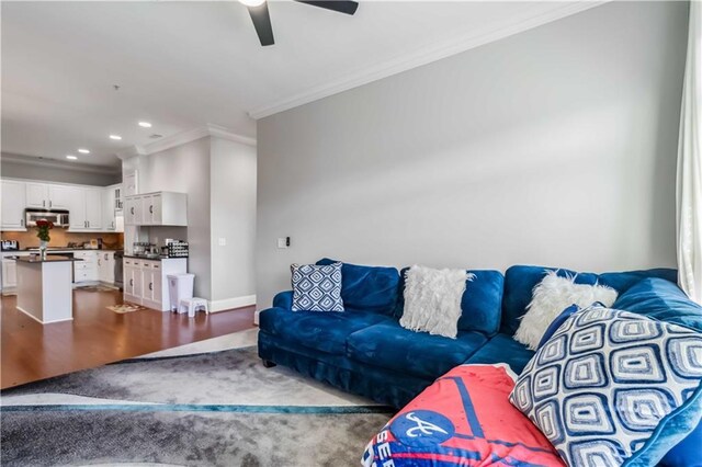 2300 Peachford Rd Unit 1410, Atlanta, GA 30338 - living room featuring ornamental molding, ceiling fan, and hardwood / wood-style flooring
