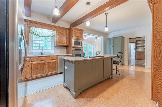 335 Cameron Ridge Dr, Atlanta, GA 30328 - kitchen featuring stainless steel appliances, beam ceiling, light floors, a healthy amount of sunlight, and a center island