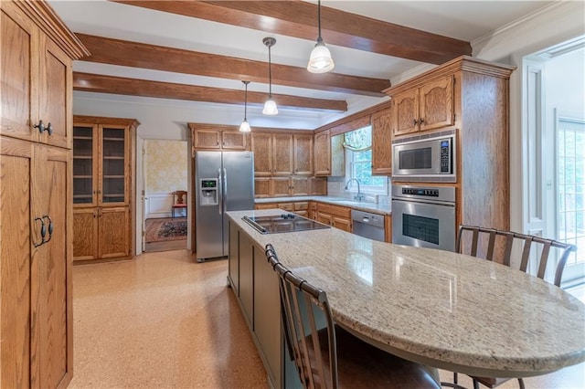 335 Cameron Ridge Dr, Atlanta, GA 30328 - kitchen with light stone countertops, decorative light fixtures, a sink, stainless steel appliances, and beam ceiling