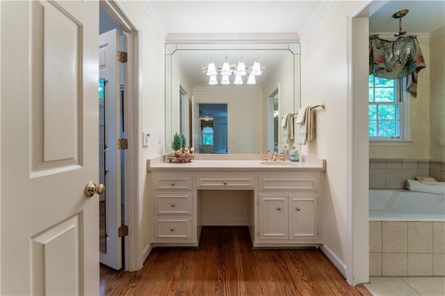 335 Cameron Ridge Dr, Atlanta, GA 30328 - bathroom with an inviting chandelier, wood finished floors, vanity, and ornamental molding
