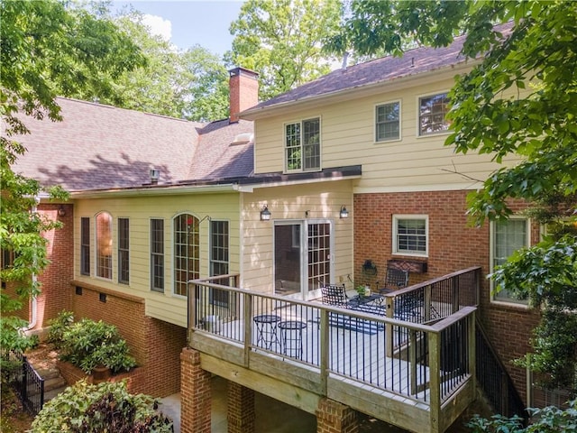 335 Cameron Ridge Dr, Atlanta, GA 30328 - rear view of property with a chimney, a wooden deck, and brick siding