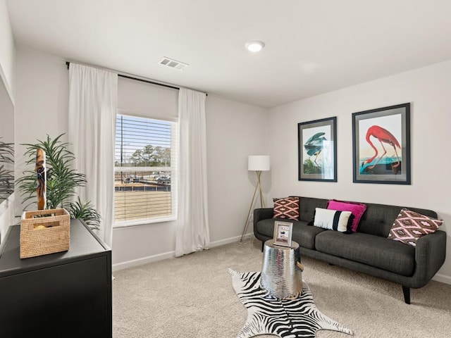 living room with light colored carpet