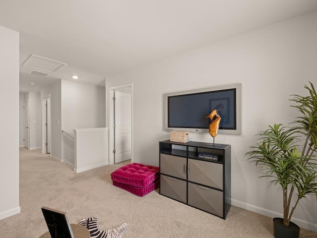 sitting room with light carpet