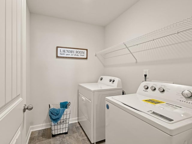 washroom featuring separate washer and dryer