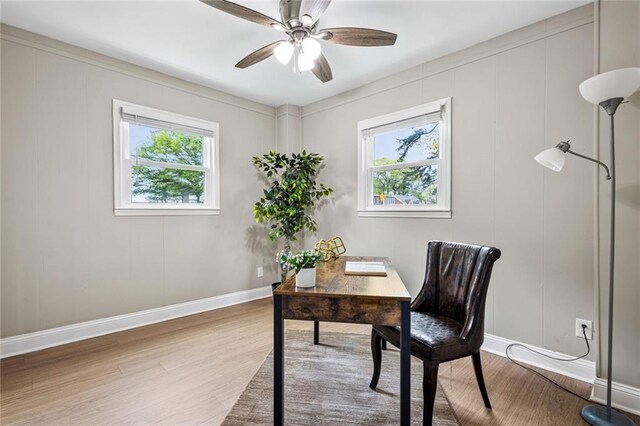 1623 Athens Ave SW, Atlanta, GA 30310 - home office with light wood finished floors, ceiling fan, and a healthy amount of sunlight