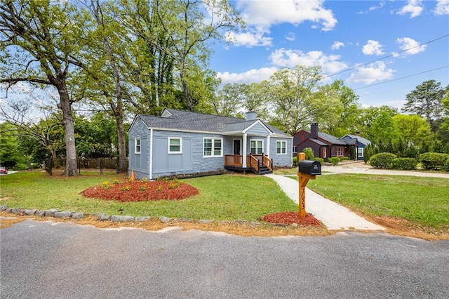 1623 Athens Ave SW, Atlanta, GA 30310 - view of front of house with a front yard and a chimney