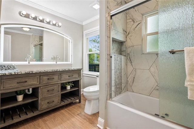 1623 Athens Ave SW, Atlanta, GA 30310 - bathroom with toilet, crown molding, vanity, wood finished floors, and shower / bath combination with glass door
