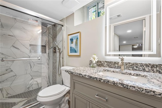 1623 Athens Ave SW, Atlanta, GA 30310 - full bathroom featuring vanity, visible vents, a marble finish shower, and toilet