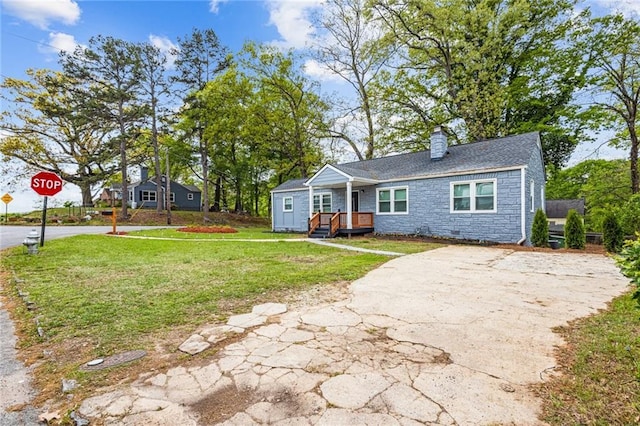 1623 Athens Ave SW, Atlanta, GA 30310 - view of front facade featuring a front yard, stone siding, and a chimney