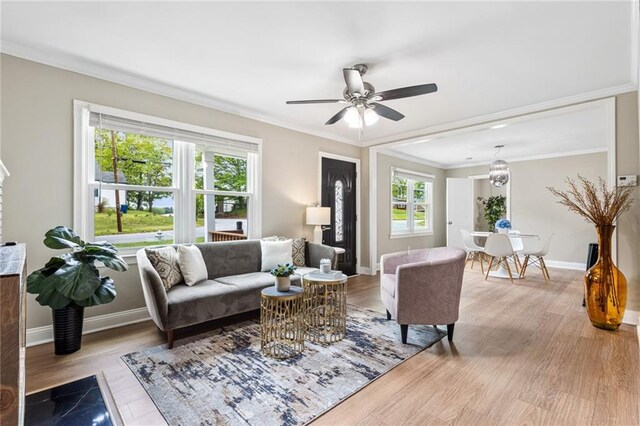 1623 Athens Ave SW, Atlanta, GA 30310 - living area featuring crown molding, wood finished floors, baseboards, and a ceiling fan