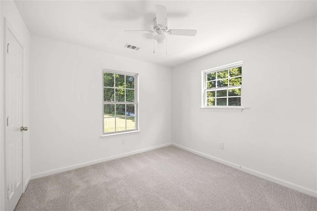 3645 Ten Oaks Cir, Powder Springs, GA 30127 - empty room with plenty of natural light, carpet floors, and baseboards
