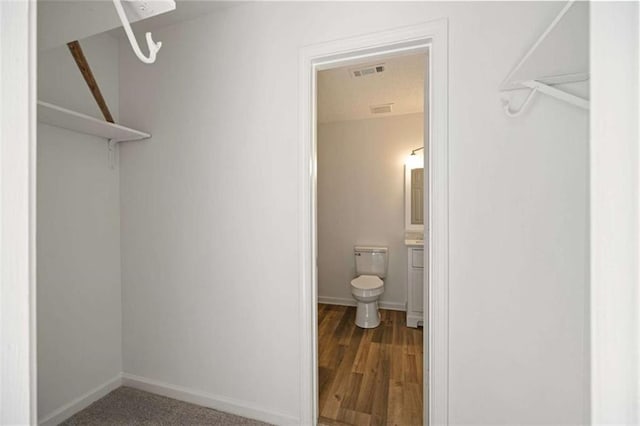 3645 Ten Oaks Cir, Powder Springs, GA 30127 - spacious closet featuring wood finished floors