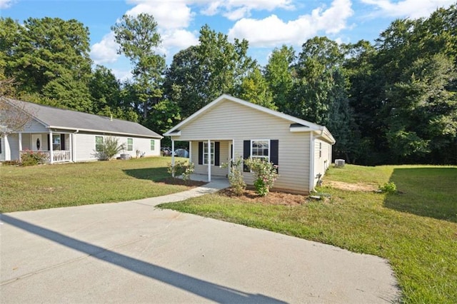 3645 Ten Oaks Cir, Powder Springs, GA 30127 - view of front of home with a porch and a front lawn