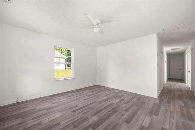 3645 Ten Oaks Cir, Powder Springs, GA 30127 - unfurnished room with attic access, a textured ceiling, wood finished floors, ceiling fan, and baseboards