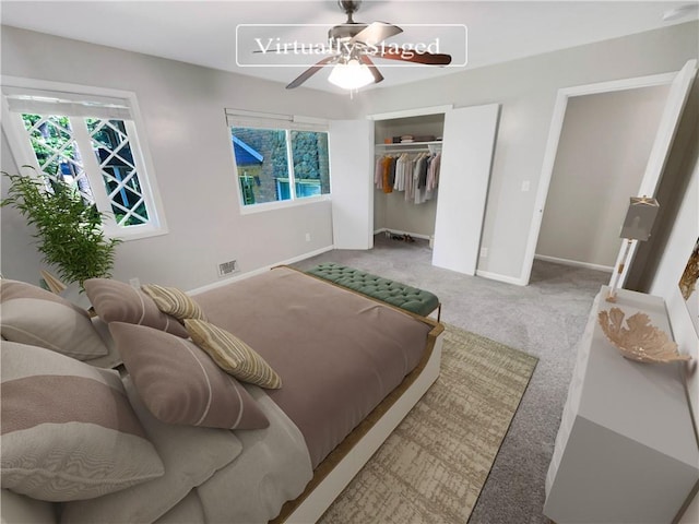 carpeted bedroom featuring a closet and ceiling fan