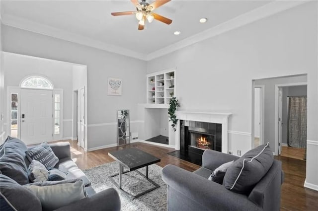 4021 Melvin Dr SW, Atlanta, GA 30331 - living area featuring a ceiling fan, a tile fireplace, wood finished floors, recessed lighting, and ornamental molding