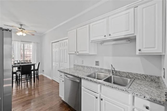 4021 Melvin Dr SW, Atlanta, GA 30331 - kitchen featuring stainless steel appliances, a ceiling fan, white cabinets, dark wood-style floors, and crown molding
