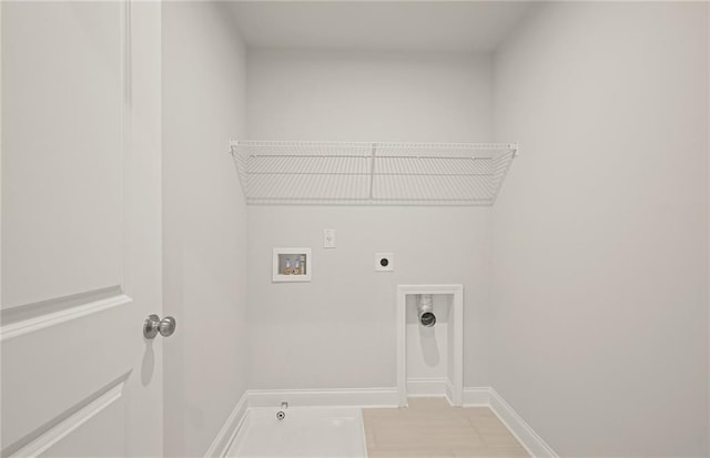 washroom featuring light tile patterned flooring, hookup for a gas dryer, hookup for a washing machine, and hookup for an electric dryer