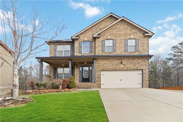 craftsman inspired home with a front yard and a garage