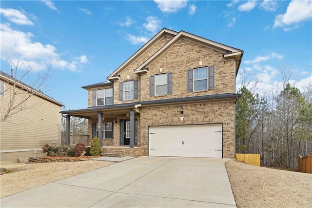 craftsman-style house with covered porch and a garage