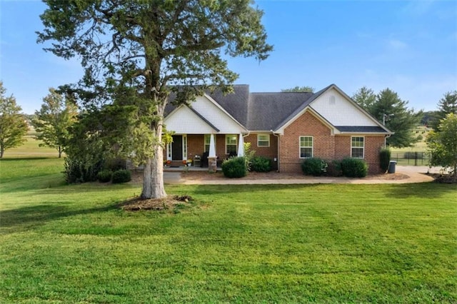 view of front of home with a front yard