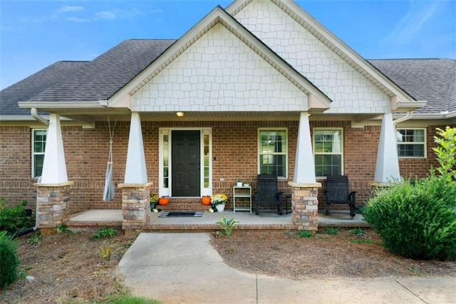 craftsman-style home featuring covered porch