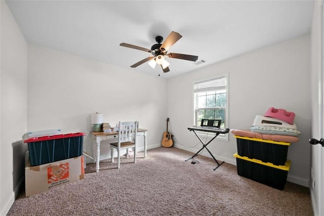 recreation room with carpet floors and ceiling fan