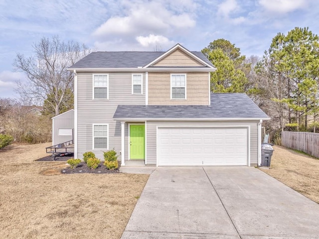 view of front of home with a garage