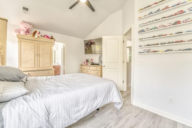 bedroom featuring vaulted ceiling, ceiling fan, and light hardwood / wood-style floors