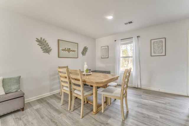 dining area featuring light hardwood / wood-style floors