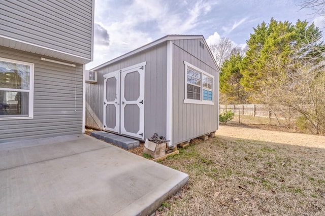 view of outbuilding with a lawn