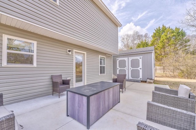 view of patio featuring an outdoor hangout area and a storage unit